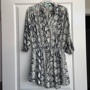 Karlie dark blue snake print mini dress. Size medium.